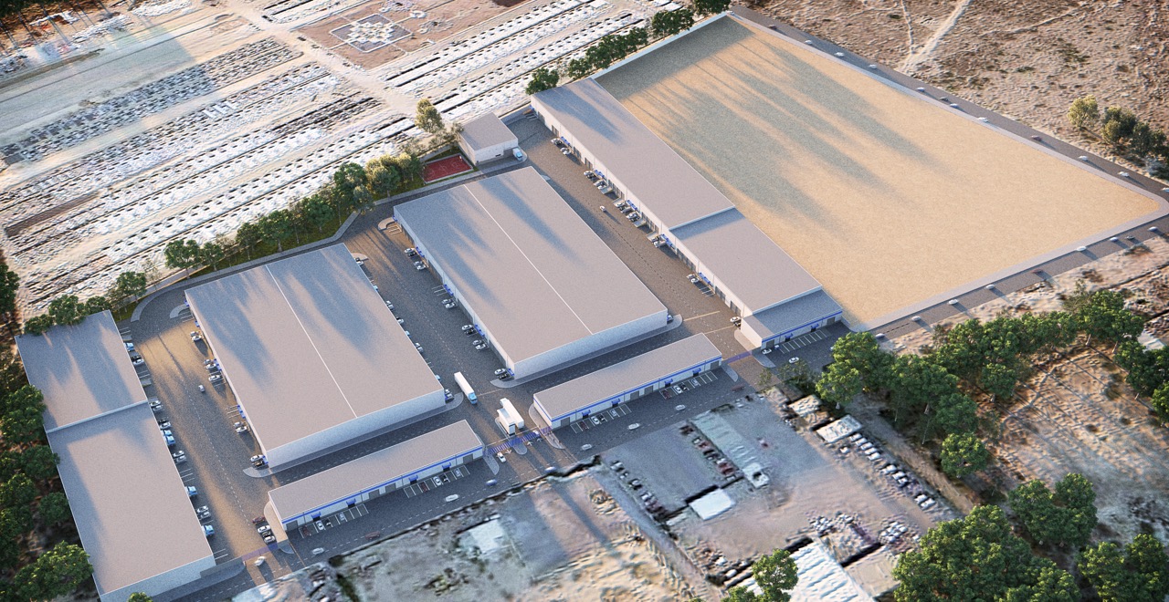 Vista aérea de naves industriales de Antares Techno Park con vialidades y área de carga